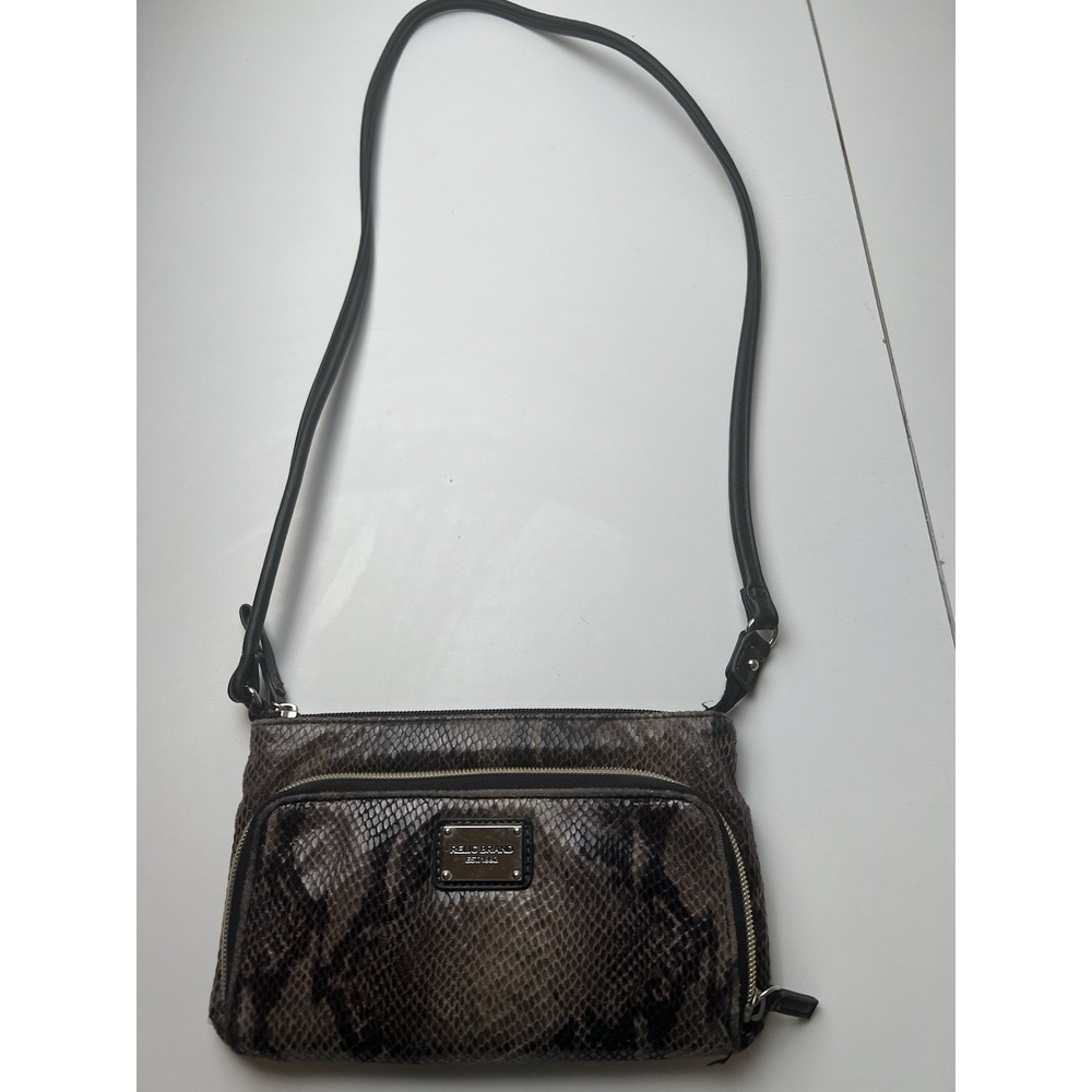 RELIC CROSSBODY PURSE ANIMAL PRINT  2 OUTSIDE POCKETS 2 INSIDE